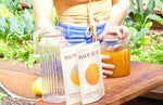 Recipe for Lion's Mane medicinal mushroom morning elixir being prepared in a vegetable garden